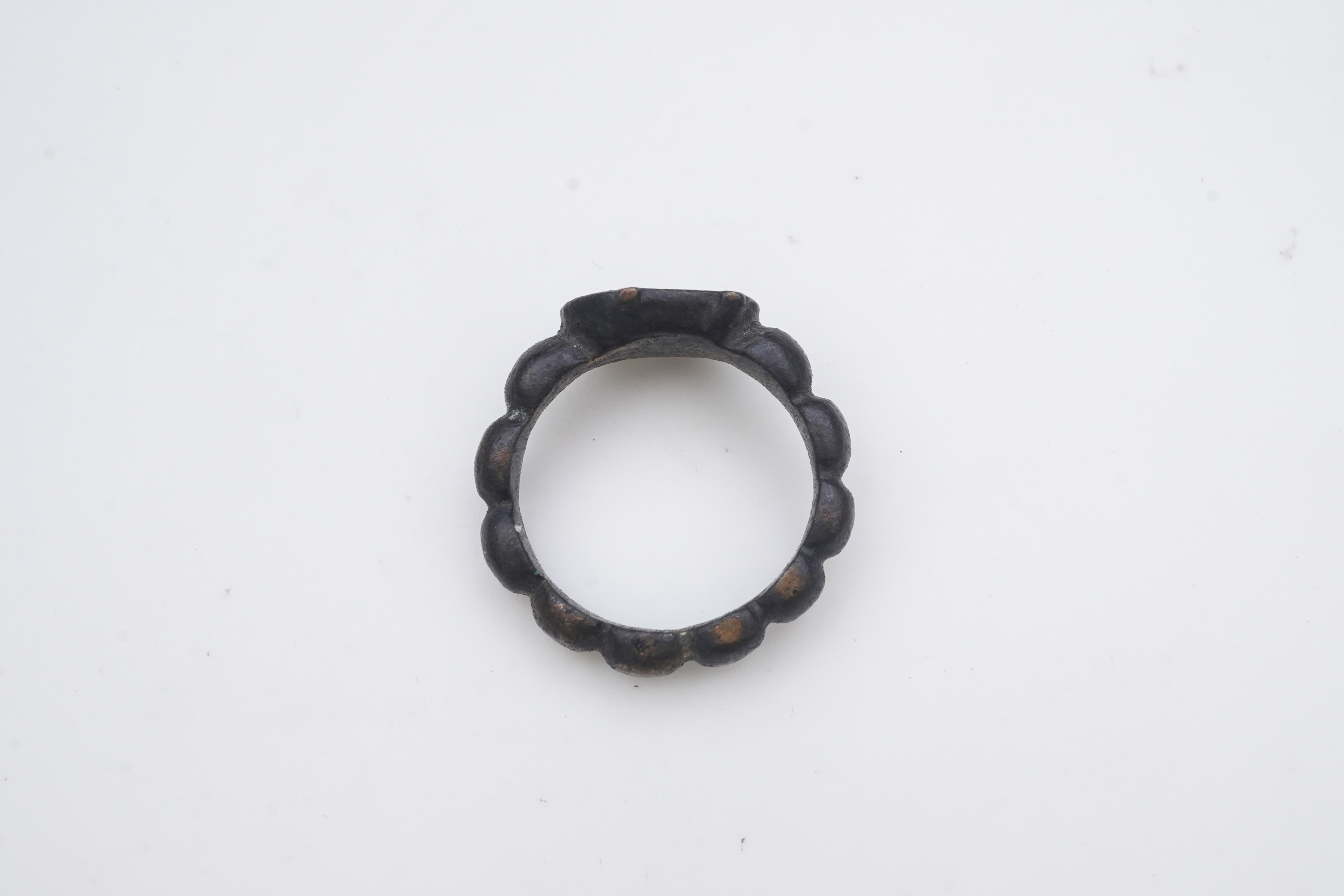 A Tudor bronze 'decade' ring, England, circa 1500